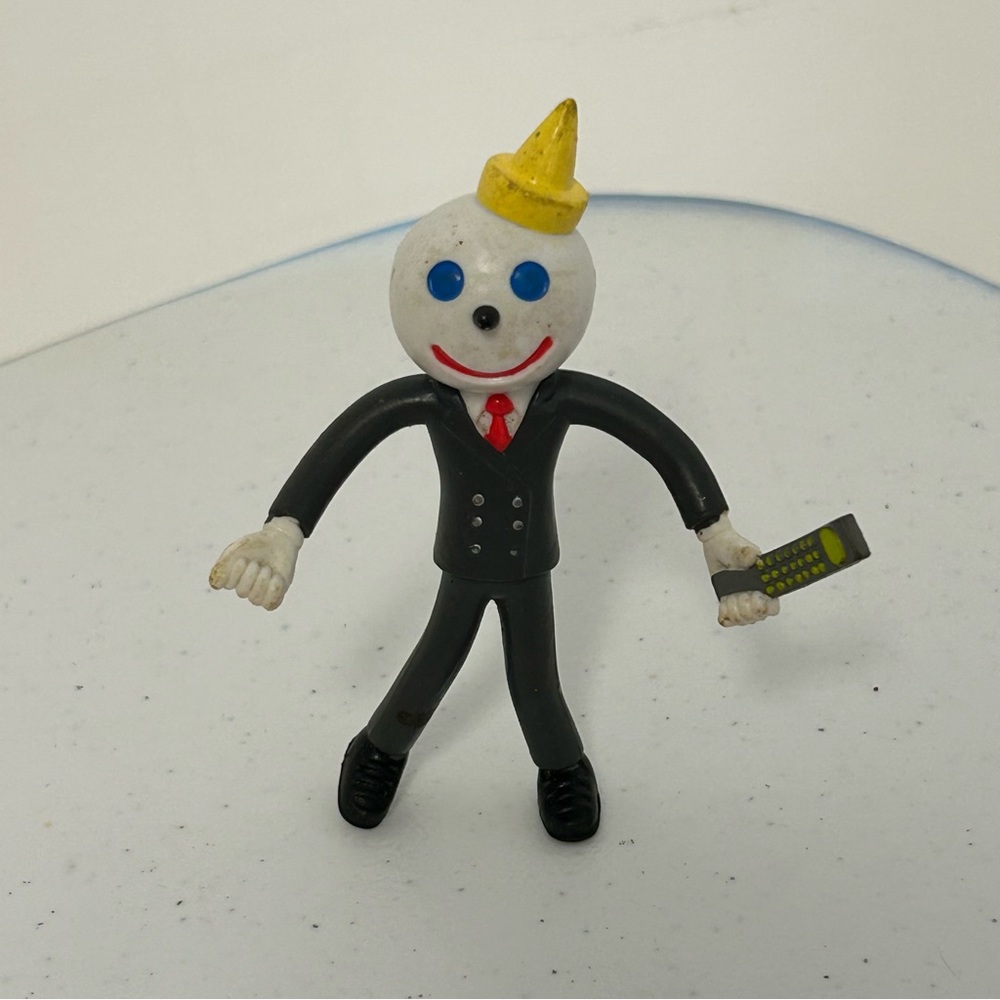 Vintage Jack in the Box Bendable Rubber Figure Suit Cell phone.‎